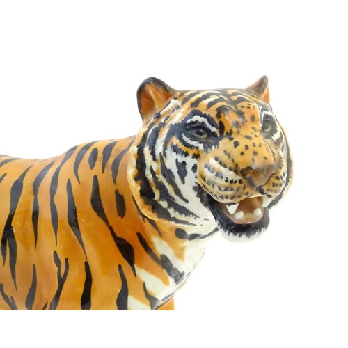 130 - A Beswick model of a tiger, model no. 2096. Marked under. Approx. 7 3/4