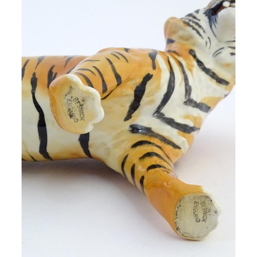 130 - A Beswick model of a tiger, model no. 2096. Marked under. Approx. 7 3/4