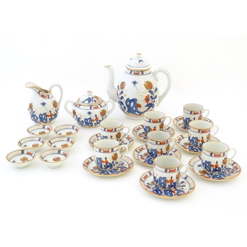 190 - A quantity of Oriental coffee wares decorated with flowers, foliage and stylised butterflies to incl... 