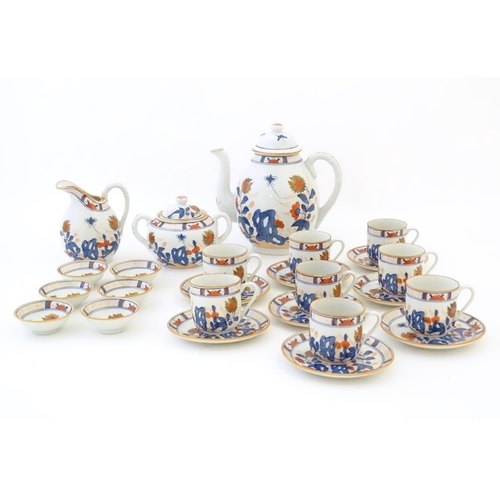 190 - A quantity of Oriental coffee wares decorated with flowers, foliage and stylised butterflies to incl... 