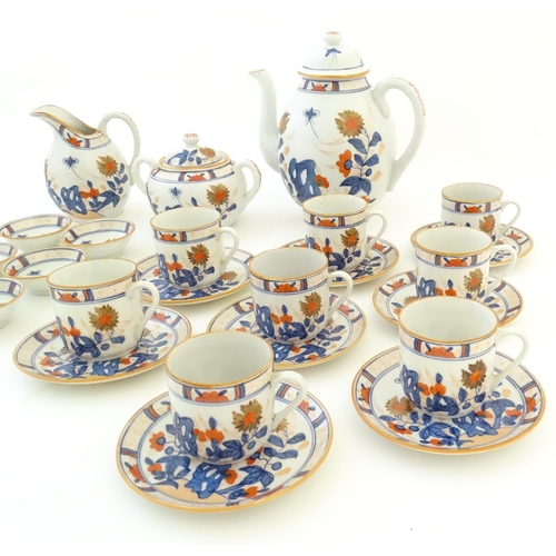 190 - A quantity of Oriental coffee wares decorated with flowers, foliage and stylised butterflies to incl... 