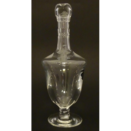 202 - St Louis Glass : A Saint Louis carafe on circular foot. Approx 12