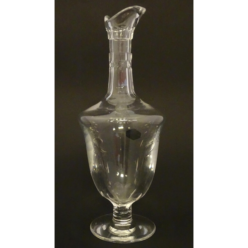 202 - St Louis Glass : A Saint Louis carafe on circular foot. Approx 12