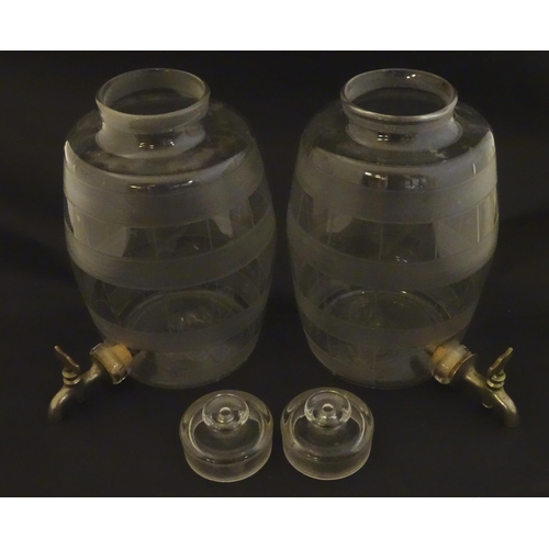 220 - Two Victorian glass spirit / rum  barrels with etched decoration and with silver plated taps. Approx... 