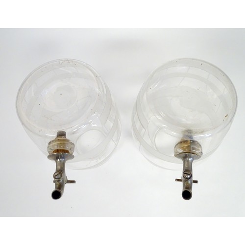 220 - Two Victorian glass spirit / rum  barrels with etched decoration and with silver plated taps. Approx... 