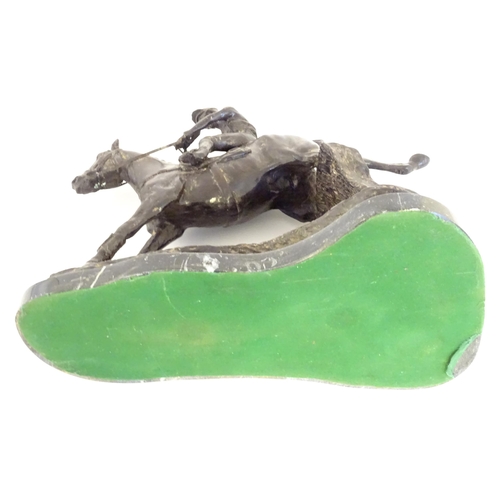 866 - A 20thC cast sculpture after David Geenty's Clearing The Last, depicting horse & jockey, on a marble... 