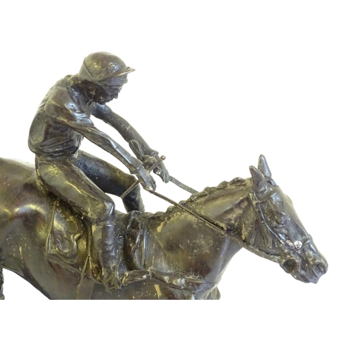 866 - A 20thC cast sculpture after David Geenty's Clearing The Last, depicting horse & jockey, on a marble... 