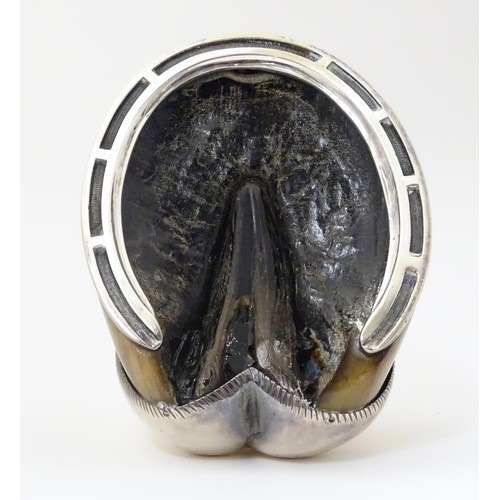 868 - Taxidermy: A late 19thC / early 20thC inkwell formed from a horse hoof with silver plate mounts. App... 