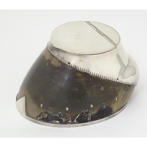 868 - Taxidermy: A late 19thC / early 20thC inkwell formed from a horse hoof with silver plate mounts. App... 