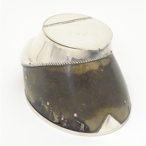 868 - Taxidermy: A late 19thC / early 20thC inkwell formed from a horse hoof with silver plate mounts. App... 