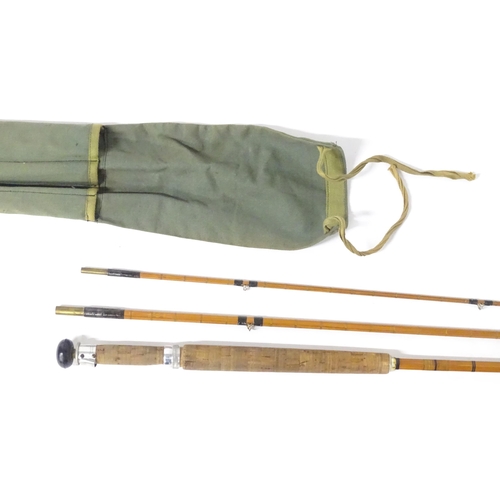 875 - Four mid 20thC fishing rods, comprising: a Milwards Flylite two-piece 7ft split cane fly rod, serial... 