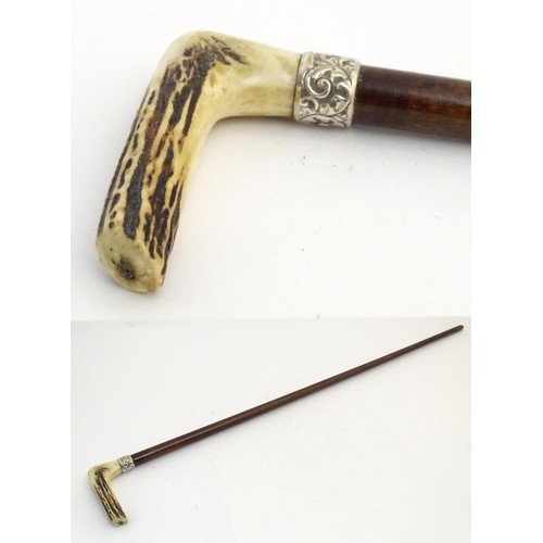 890 - A 19thC walking stick with antler handle, tapered shank, brass ferrule and silver collar, hallmarked... 