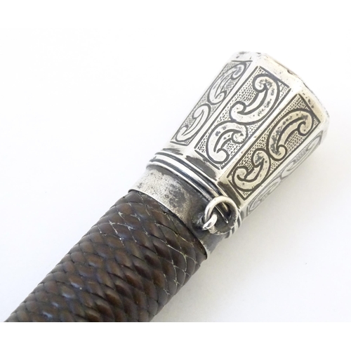 891 - A 19thC riding whip, having woven leather detail with a white metal collar & pommel with C scroll de... 