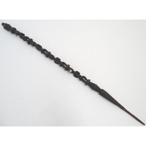 892 - Ethnographic / Native / Tribal: A carved African hardwood ceremonial staff composed of four carved f... 