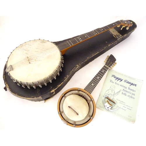 896 - Musical Instruments : a vintage Lyon & Healy (Chicago USA) five-string banjo, with maple neck, steel... 