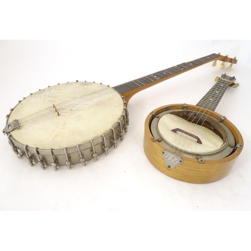 896 - Musical Instruments : a vintage Lyon & Healy (Chicago USA) five-string banjo, with maple neck, steel... 