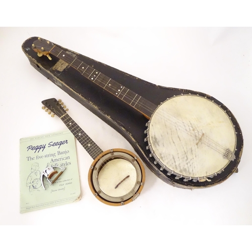 896 - Musical Instruments : a vintage Lyon & Healy (Chicago USA) five-string banjo, with maple neck, steel... 