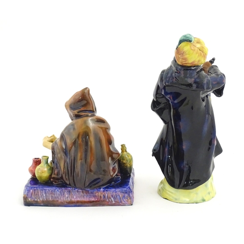 106 - Two Royal Doulton figures comprising Blue Beard, model no. HN2105, and The Potter, model no. HN1493.... 