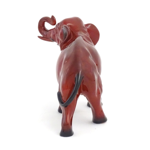 114 - A Royal Doulton flambe model of an elephant. Marked under. Approx. 5 1/4