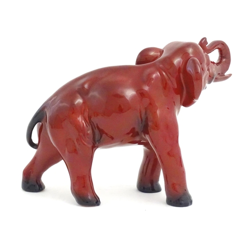 114 - A Royal Doulton flambe model of an elephant. Marked under. Approx. 5 1/4