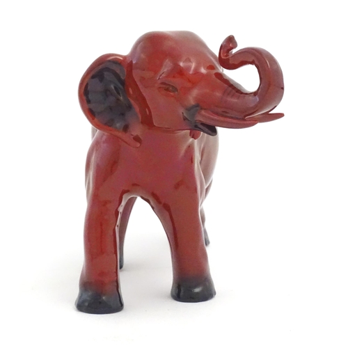 114 - A Royal Doulton flambe model of an elephant. Marked under. Approx. 5 1/4