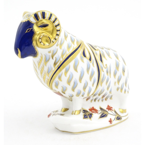 121 - A Royal Crown Derby paperweight modelled as a ram. Marked under with gold stopper. Approx. 5 1/2