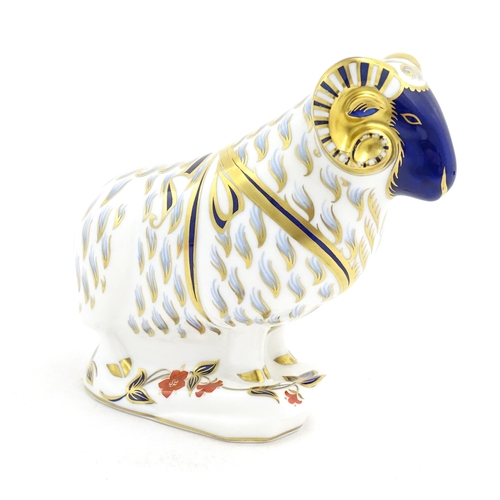 121 - A Royal Crown Derby paperweight modelled as a ram. Marked under with gold stopper. Approx. 5 1/2