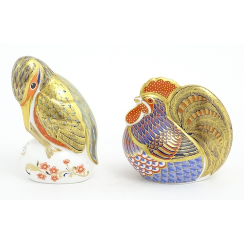 122 - Two Royal Crown Derby paperweights, one modelled as a cockerel / rooster, the other modelled as a ki... 