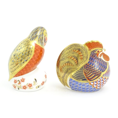 122 - Two Royal Crown Derby paperweights, one modelled as a cockerel / rooster, the other modelled as a ki... 