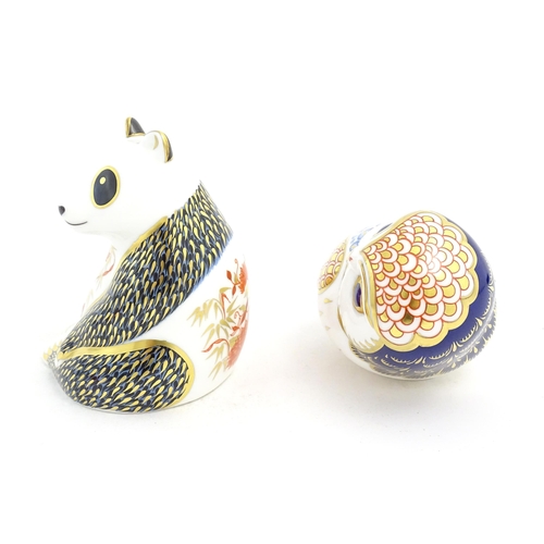 125 - Two Royal Crown Derby paperweights one modelled as a panda bear, the other as an owl. Both marked un... 