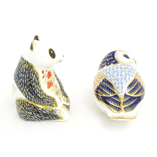 125 - Two Royal Crown Derby paperweights one modelled as a panda bear, the other as an owl. Both marked un... 