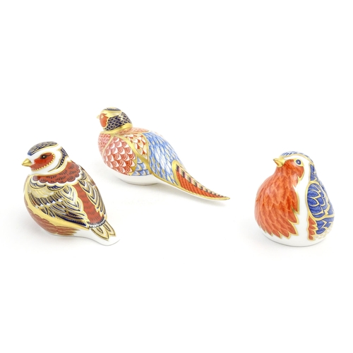 126 - Three Royal Crown Derby paperweights modelled as birds, comprising robin, chaffinch and pheasant. Ea... 