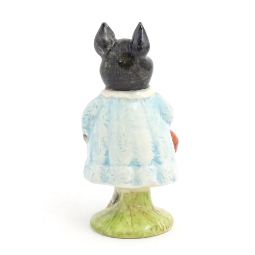 133 - A Beswick Beatrix Potter figure titled Pig-Wig, no. BP3B. Marked under. Approx. 4