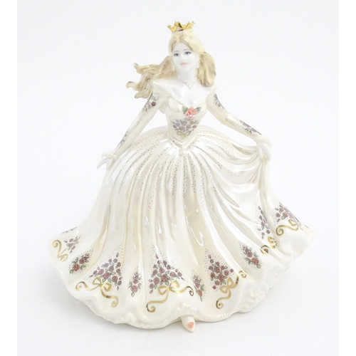 146 - A Coalport limited edition model of Cinderella, no. 24/2000. Marked under. With certificate of authe... 