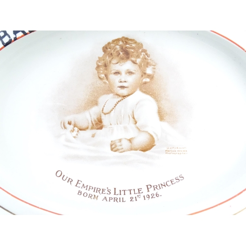 173 - An early 20thC Paragon oval baby plate commemorating the birth of Elizabeth II with transfer image o... 