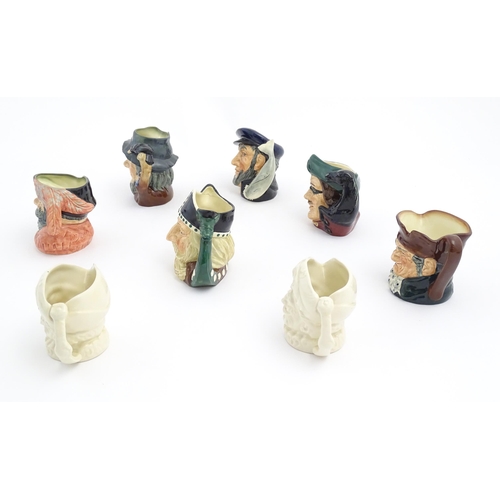 176 - A quantity of assorted Royal Doulton character jugs to include Dick Turpin, Rip Van Winkle, Falstaff... 