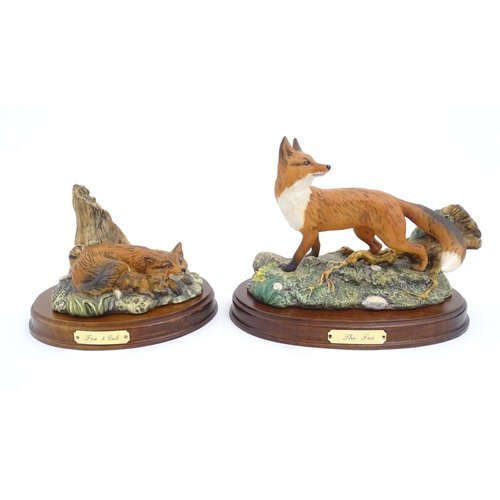 181 - Four Royal Doulton models of animals from the Wildlife collection comprising Fox & Cub, Fox, Otter, ... 