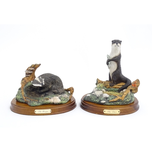 181 - Four Royal Doulton models of animals from the Wildlife collection comprising Fox & Cub, Fox, Otter, ... 