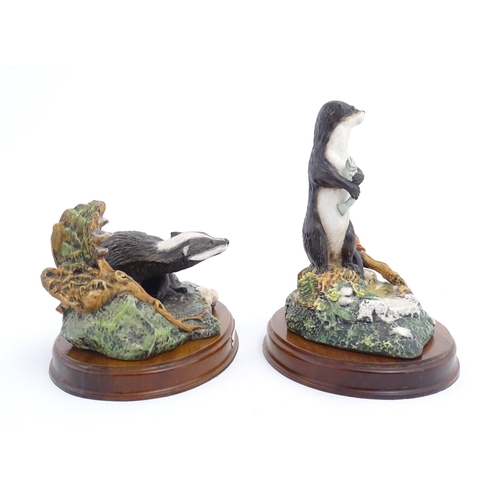 181 - Four Royal Doulton models of animals from the Wildlife collection comprising Fox & Cub, Fox, Otter, ... 