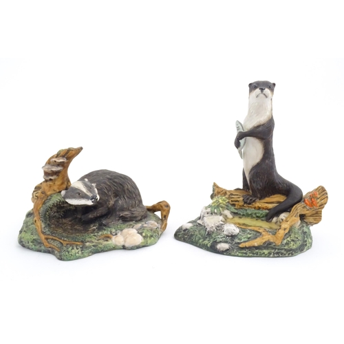 181 - Four Royal Doulton models of animals from the Wildlife collection comprising Fox & Cub, Fox, Otter, ... 