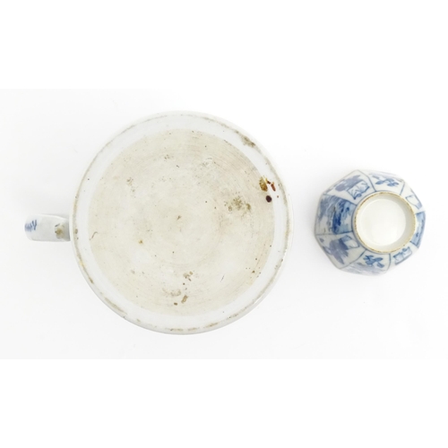 38 - A Chinese blue and white mug with floral roundel decoration and a banded border. Together with a Chi... 