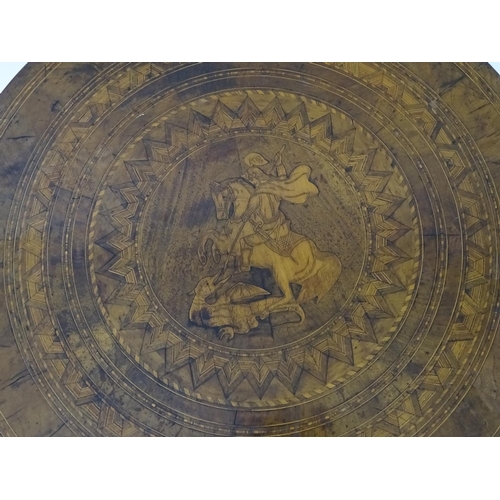 1502 - A 19thC Sorrento table with a profusely inlaid marquetry top and having a turned pedestal base with ... 