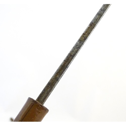 1807 - Militaria / Arms & Armour : A 19thC swordstick walking cane, the bamboo shank concealing a 22 5/8