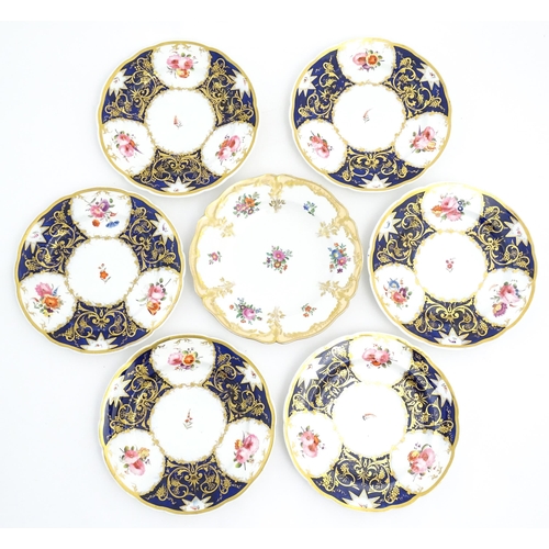 169 - Six 19thC dessert plates with floral and foliate decoration and gilt fruiting vine detail. Together ... 