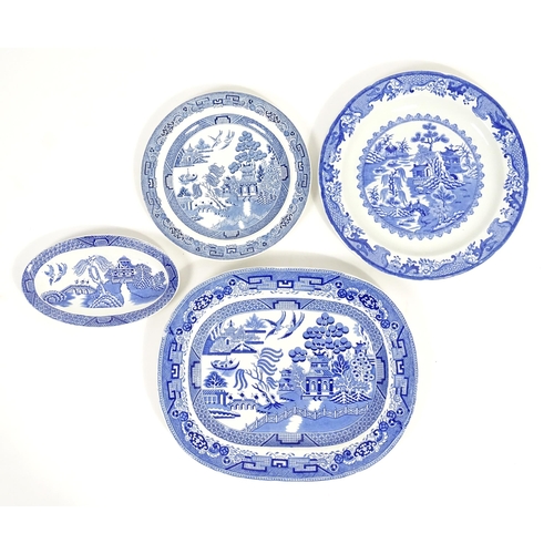 187 - A quantity of assorted blue and white dinner wares to include dinner plates, meat plate, serving dis... 