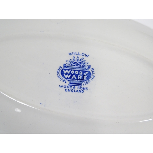 187 - A quantity of assorted blue and white dinner wares to include dinner plates, meat plate, serving dis... 