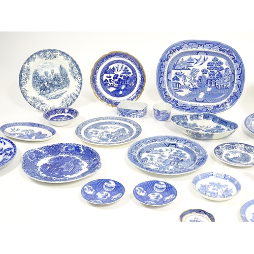 187 - A quantity of assorted blue and white dinner wares to include dinner plates, meat plate, serving dis... 