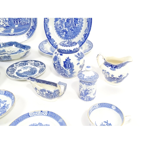 187 - A quantity of assorted blue and white dinner wares to include dinner plates, meat plate, serving dis... 