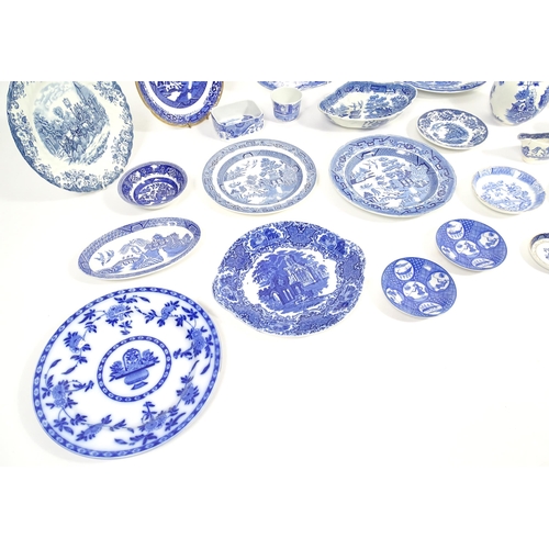 187 - A quantity of assorted blue and white dinner wares to include dinner plates, meat plate, serving dis... 