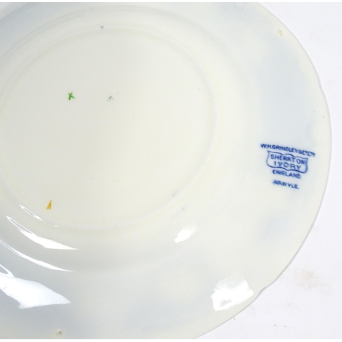 188 - A quantity of Grindley & Co. dinner wares in the Sheraton Ivory pattern, to include oval serving dis... 